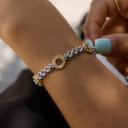 Two-tone circle-link bracelet worn on wrist