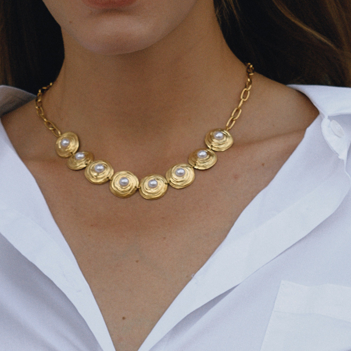 Gold-Tone Pearl-Look Stainless Steel Necklace and Bracelet Collection shown on model