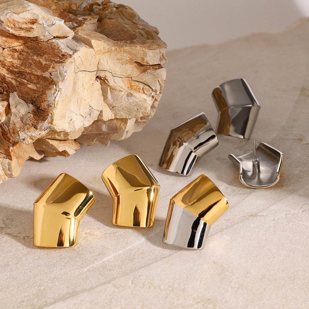 Folded Sculptural Stainless Steel Stud Earrings in Two Finishes shown on model