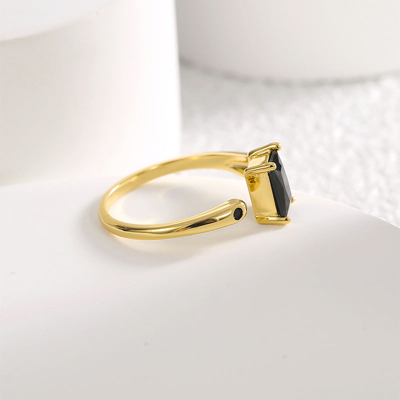 side profile of the prong-set black stone adjustable ring