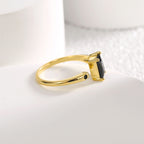side profile of the prong-set black stone adjustable ring