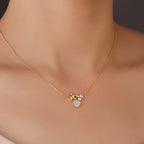model wearing the petite gold plated star cluster necklace