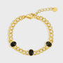 gold plated brass chain bracelet with three black agate cabochons