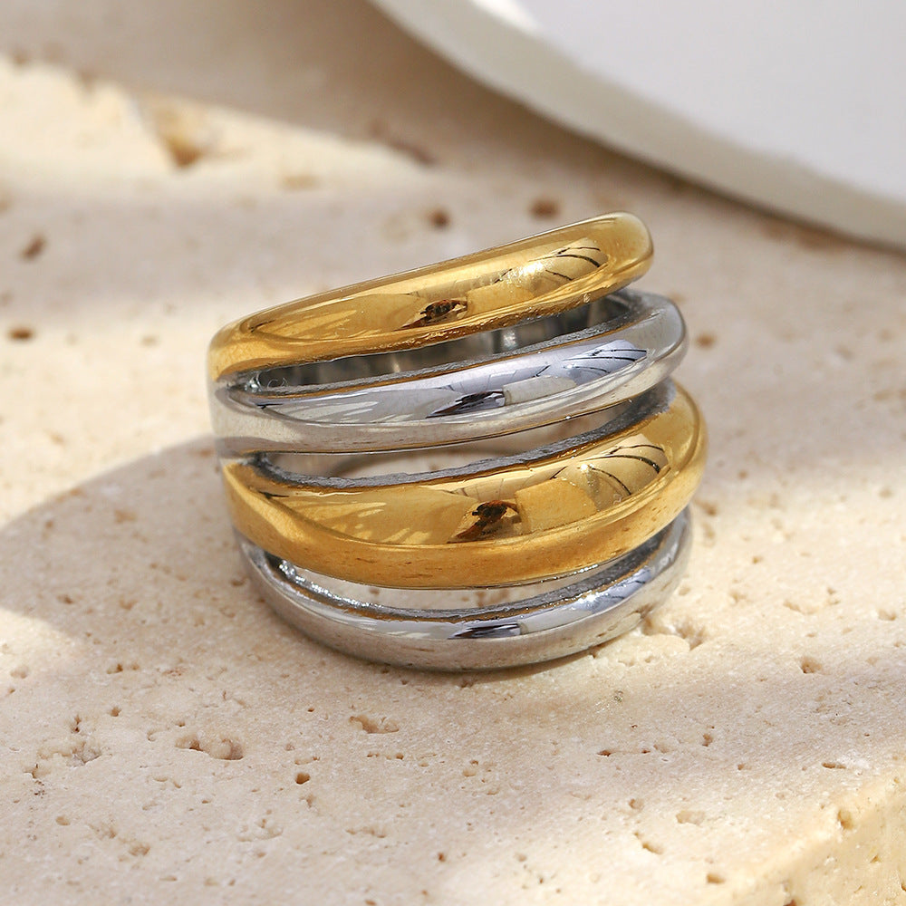 two-tone stainless steel layered band ring in gold and silver finishes