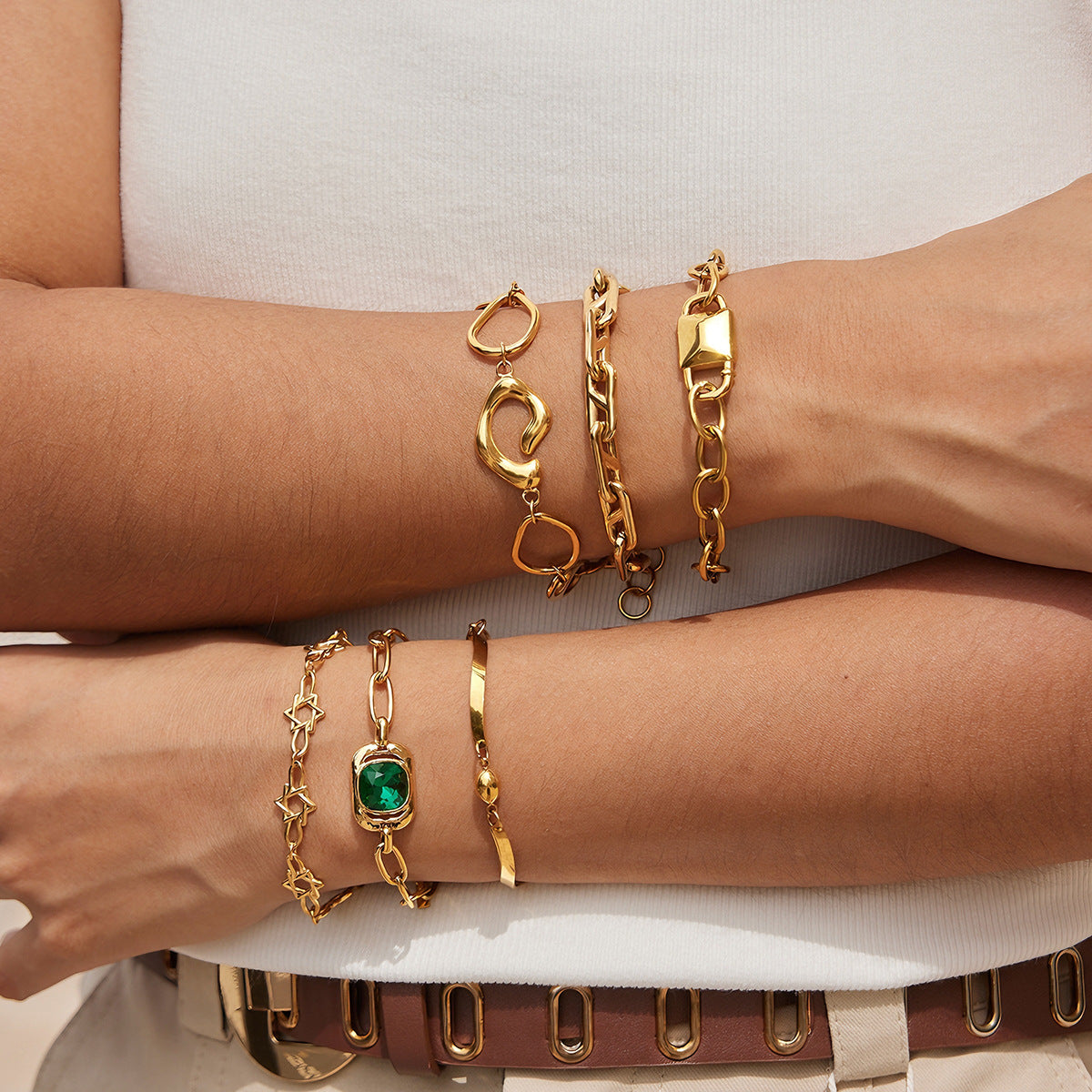 Six stainless steel bracelet designs styled together