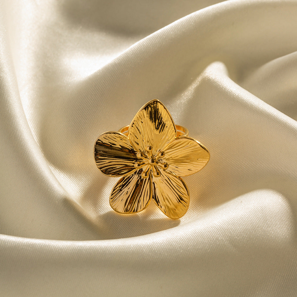 Close-up of fine lines across gold plated flower petals