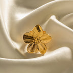 Close-up of fine lines across gold plated flower petals