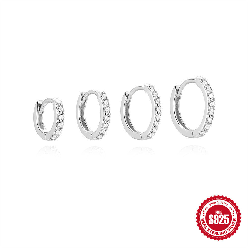 four sizes of silver-finish 925 silver moissanite huggie earrings