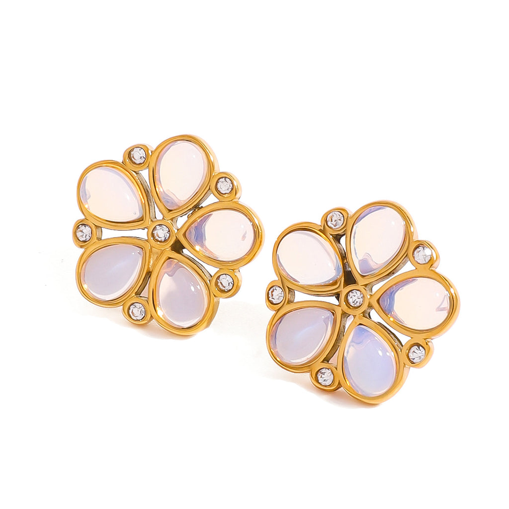 front view of pearlescent petal flower stud earrings