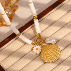 Gold plated shell charm necklace close-up