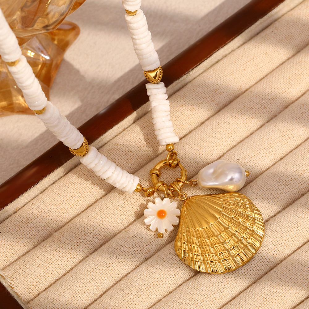 Gold plated shell charm necklace close-up