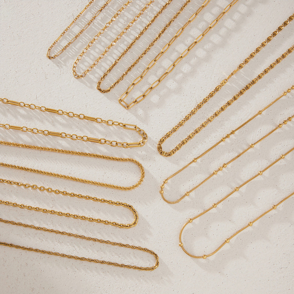 Eleven chain styles arranged in curved parallel rows