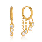 isolated gold plated chain hoop earrings with round clear accents