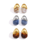 Brown white and blue resin stud pairs