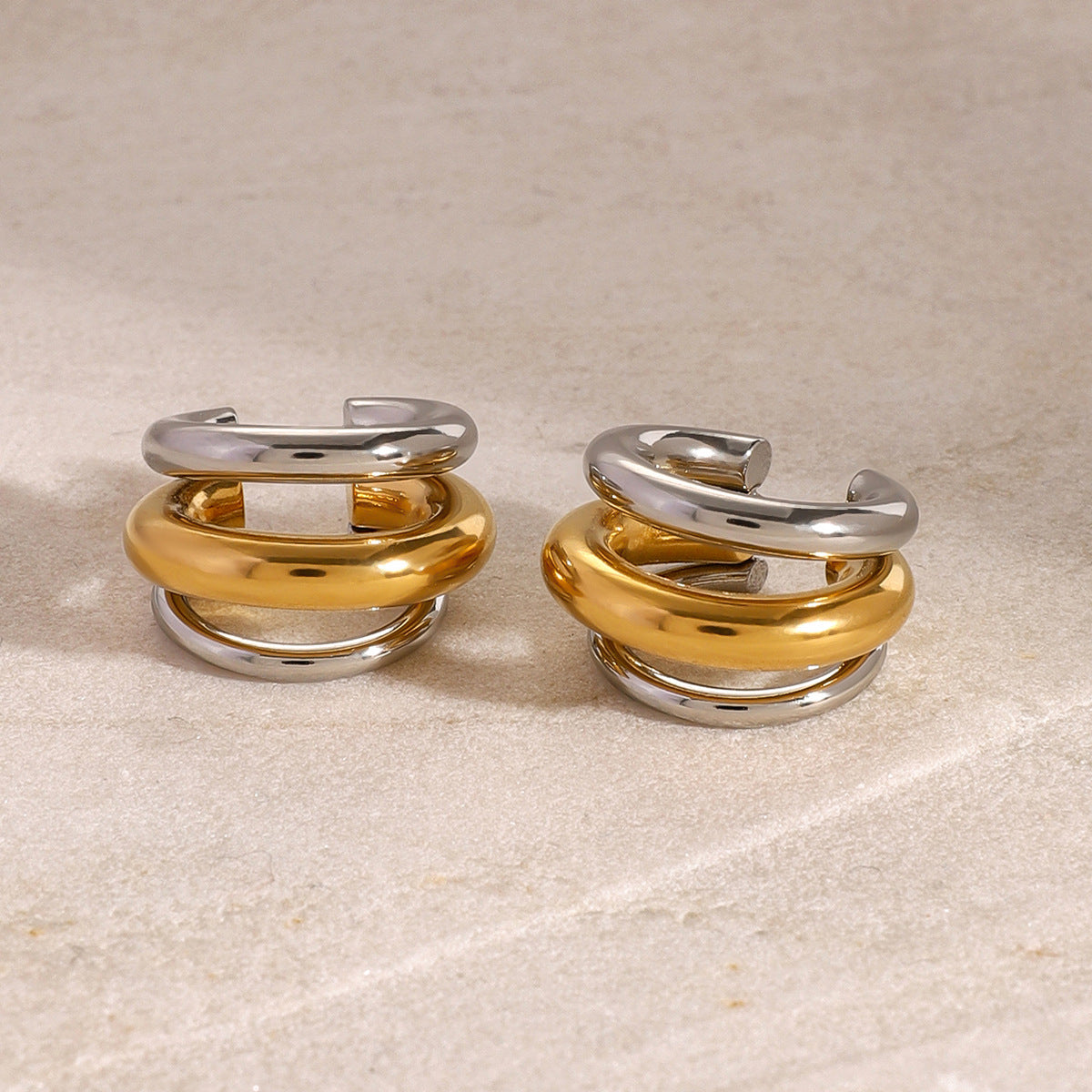 Two-Tone Sculptural Stainless Steel Clip-On Earrings on-model view