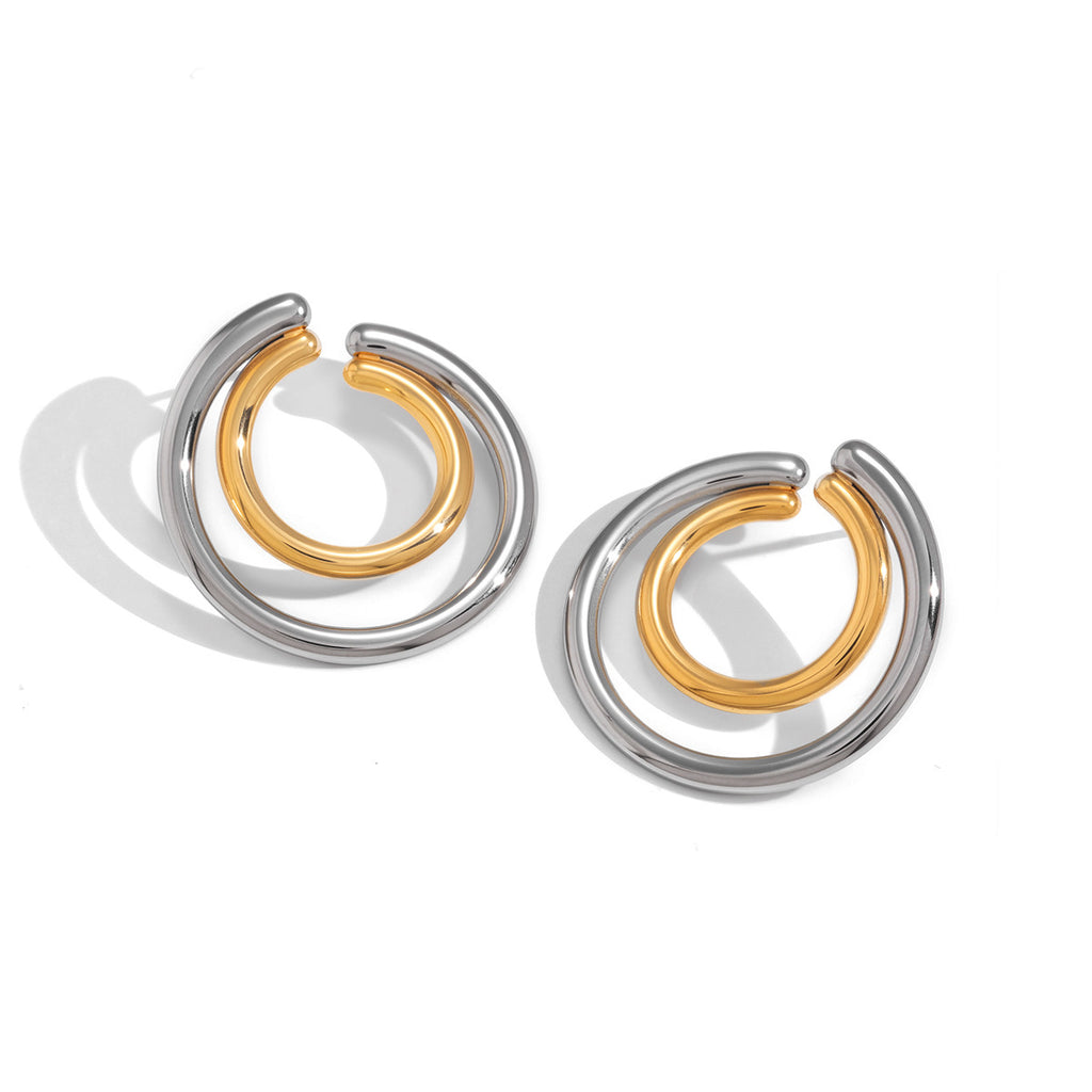 White-background view of polished gold and silver-colored double hoops