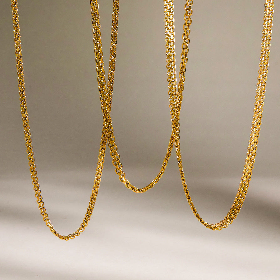 Three link chain profiles hanging side by side