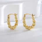 compact brass rope-textured hoop earrings standing upright
