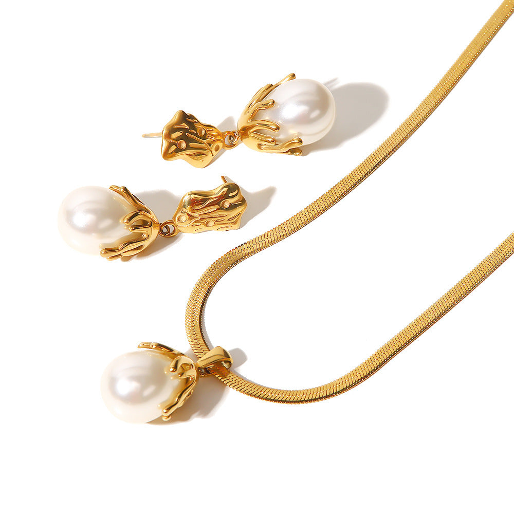 Necklace and earrings showing irregular caps and textured stud tops