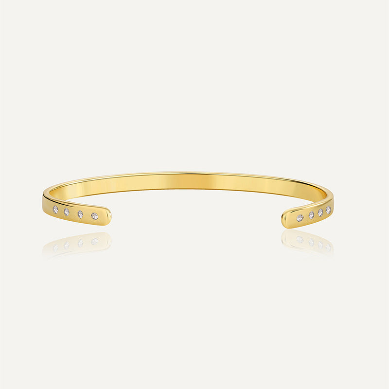 gold plated brass open bangle with clear zirconia-set ends