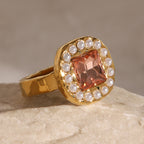 Close-up of faceted peach center and white bead frame