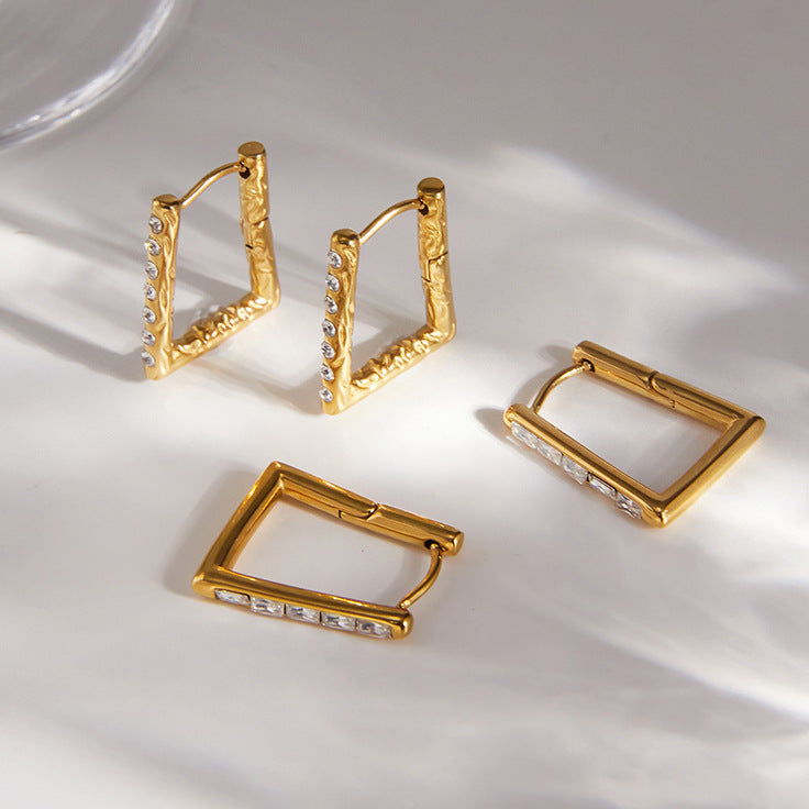 Two trapezoid stone hoop designs arranged together
