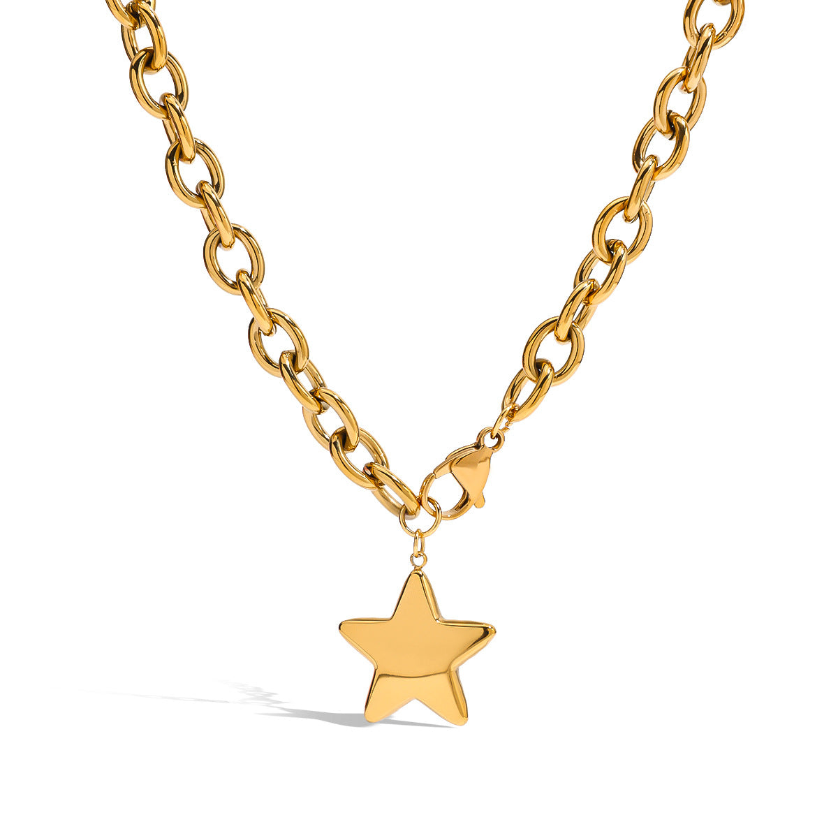 Gold-tone oval-link chain with a single star pendant