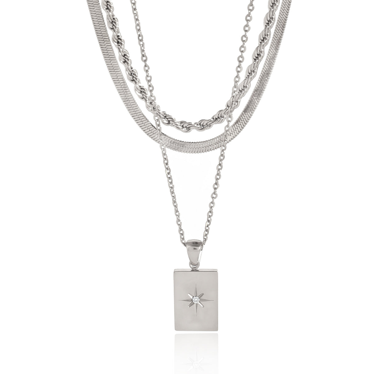 Front view of silver-color three-strand star tag necklace