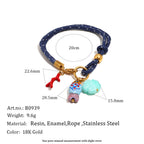 Navy cord bracelet with fish charm measurement chart