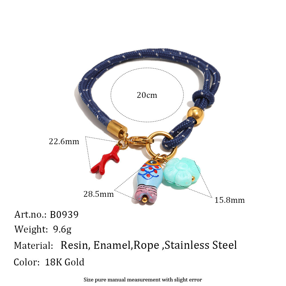 Navy cord bracelet with fish charm measurement chart