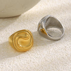front and back views of gold plated and silver ripple rings