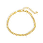 curved display of gold plated brass Cuban bracelet