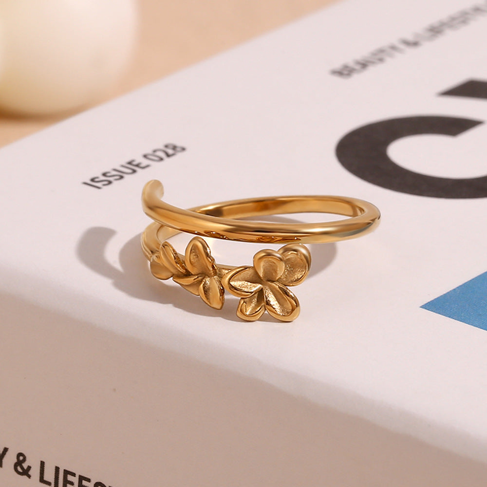 side view of the sculpted flower double-line open ring