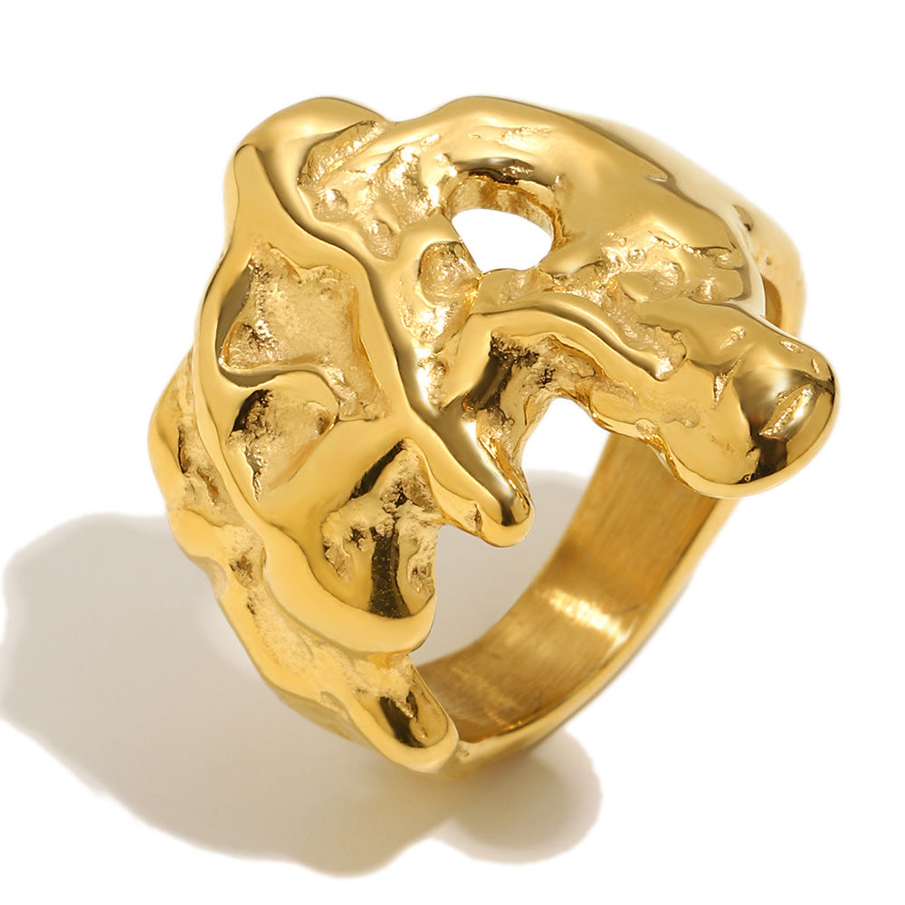 isolated meteorite-inspired textured ring at an angle