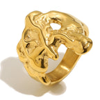isolated meteorite-inspired textured ring at an angle