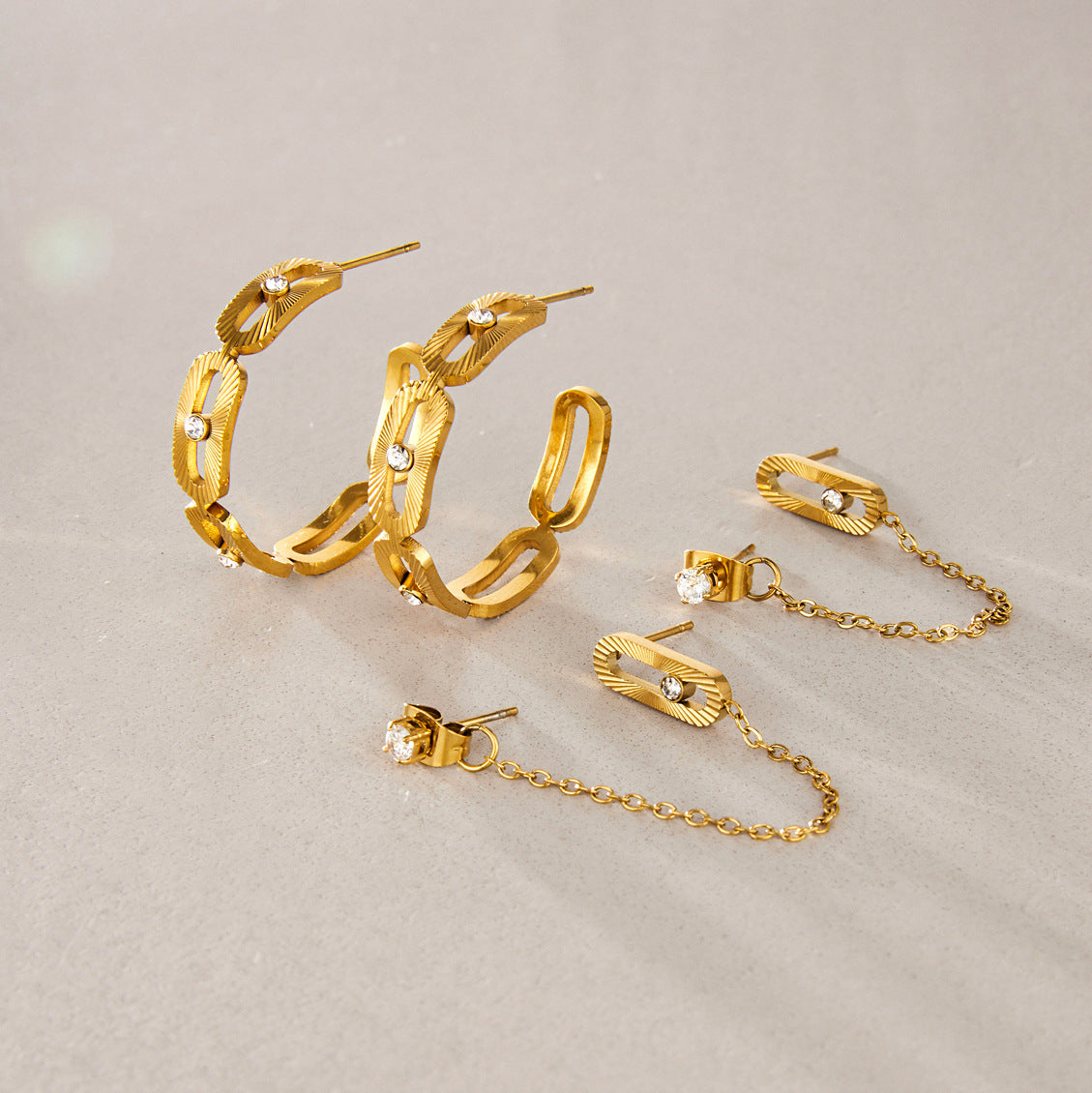 Front and back of link hoops and chain earrings