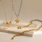 Star pendant and clustered star necklaces displayed together