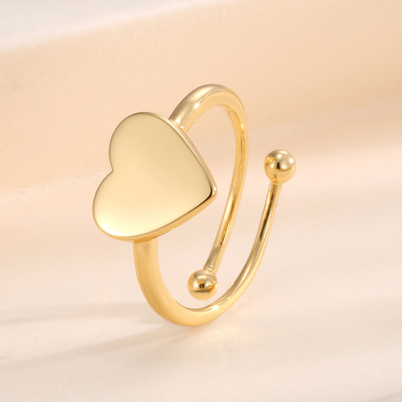 upright view of the smooth heart face on an open ring