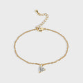 gold plated brass chain bracelet with clear heart-shaped pendant