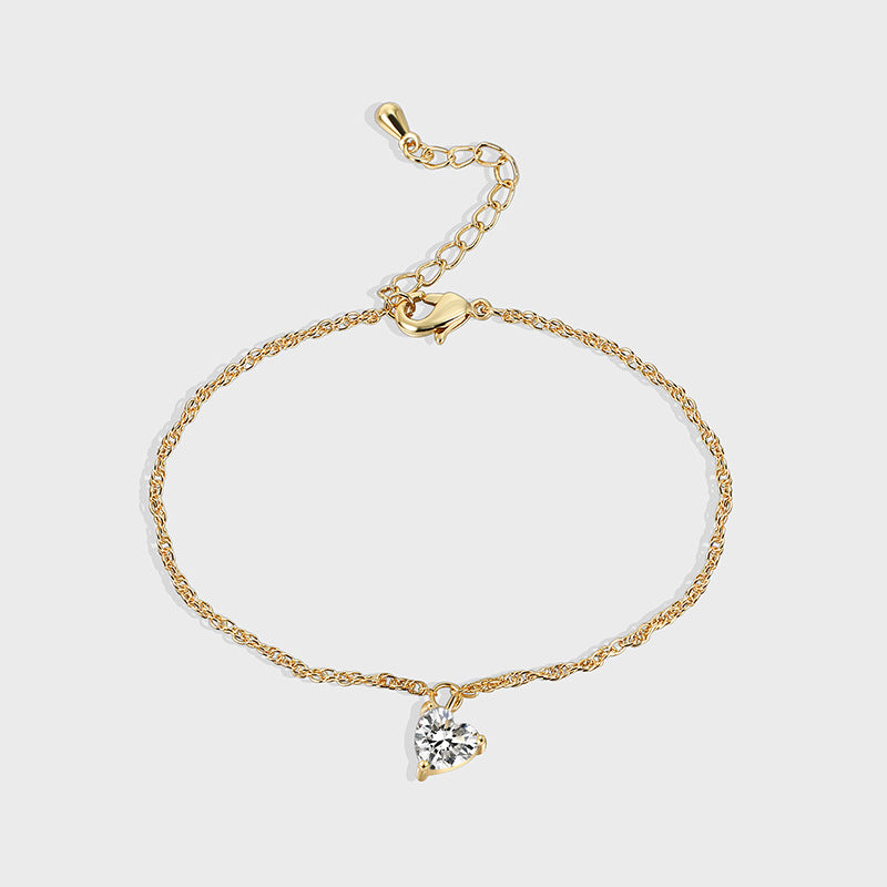 gold plated brass chain bracelet with clear heart-shaped pendant