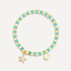 aqua and gold-color beaded bracelet with starfish charm