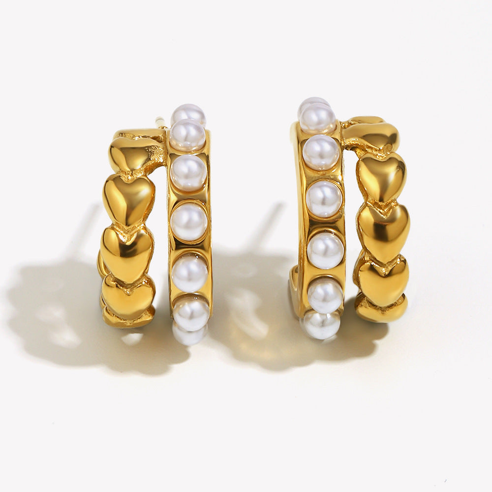 isolated front and side view of heart-link imitation pearl hoops