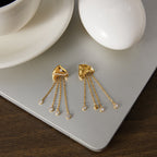 Fish motif earrings with chains spread out