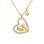 isolated gold plated baby footprint heart pendant necklace