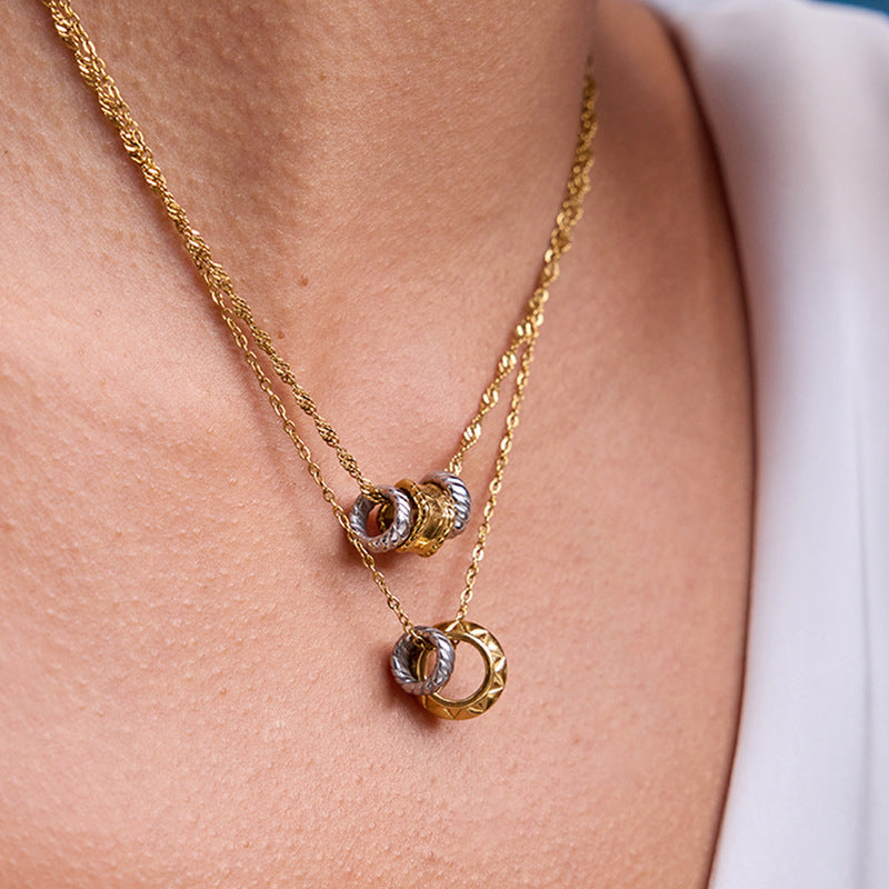 Sculptural Stainless Steel Pendant Necklace Collection shown on model