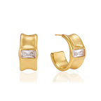 Broad gold-tone open hoops with rectangular clear centers