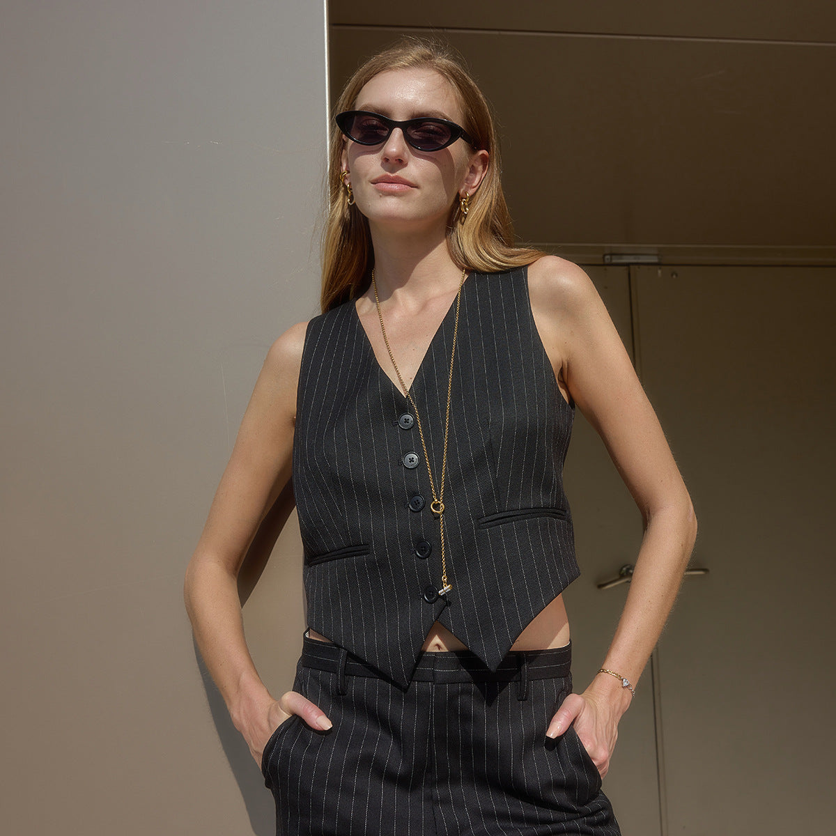 Long paperclip necklace shown on a model