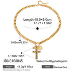 Chunky chain cross pendant necklace with green and clear accents