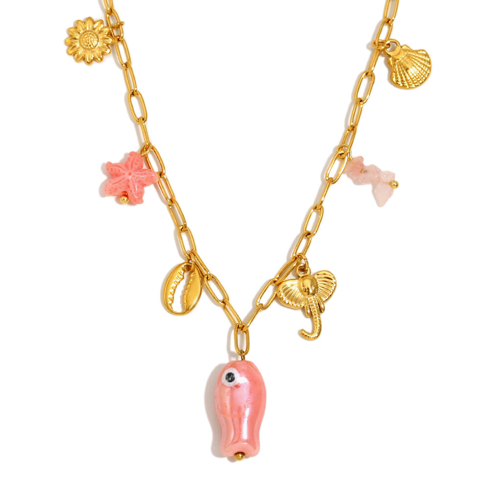 isolated front view of the multicharm pink fish necklace
