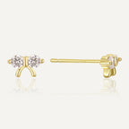 gold plated twin clear stone bow stud earrings front and side view